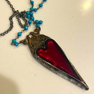 Red heart lovebird necklace purchased in New Orleans. Heather Elizabeth …